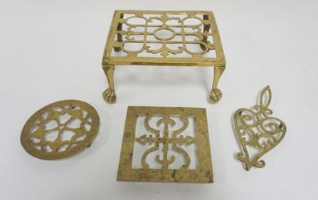 GROUP OF ANTIQUE BRASS TRIVETS