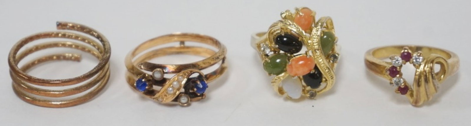 LADIES GOLD RINGS: 4 LADIES GOLD COLOR RINGS, 1 MARKED 14K GF