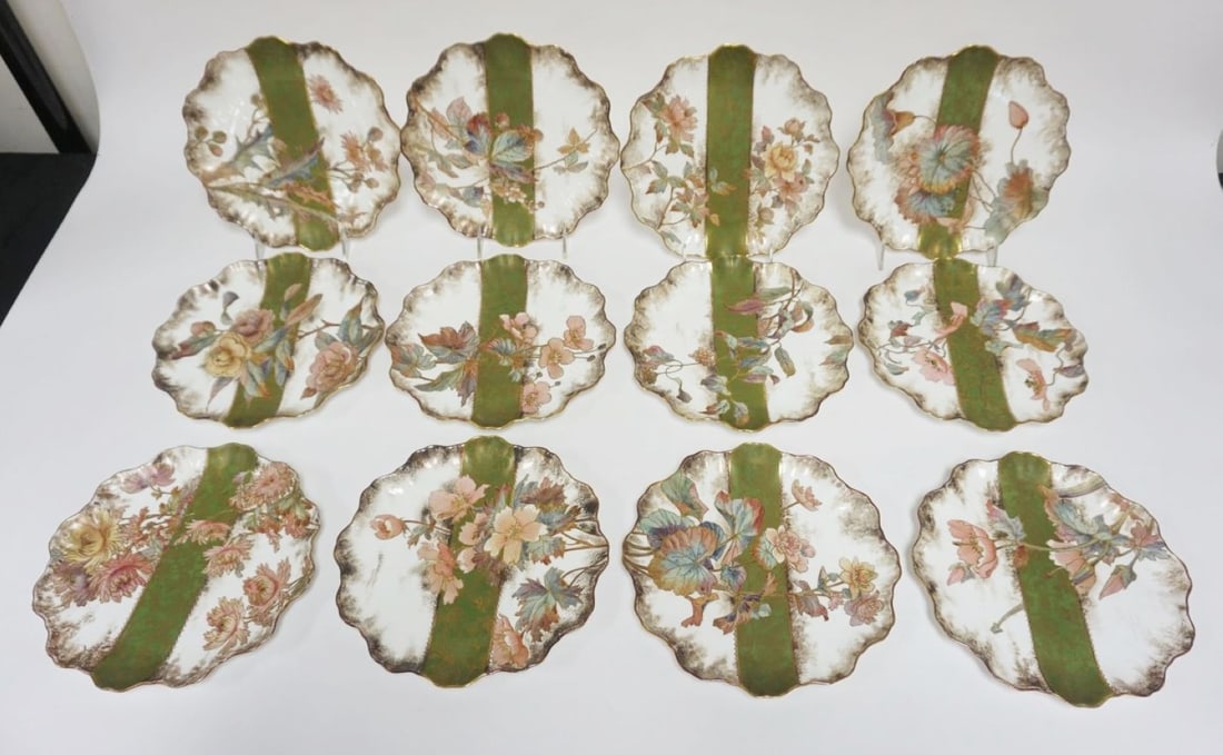 12 DOULTON BURSLEM SCALLOPED EGDE PLATES: 12 DOULTON BURSLEM SCALLOPED EGDE PLATES W/IMAGES OF FLOWERS, EACH APPROXIMATELY 9 IN