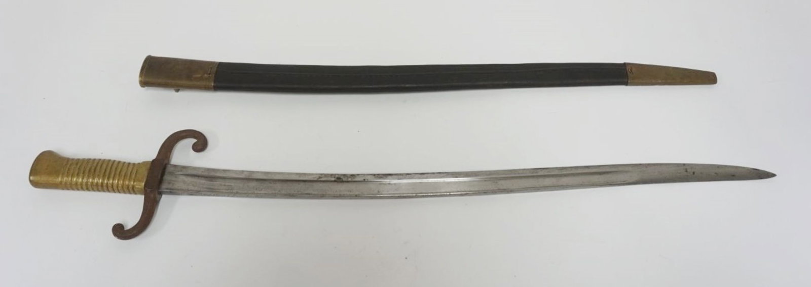 ANTIQUE SWORD & LEATHER/BRASS SCABBARD: ANTIQUE SWORD & LEATHER/BRASS SCABBARD INSCRIBED ON TOP OF BLADE, APPROXIMATELY 28 IN LONG