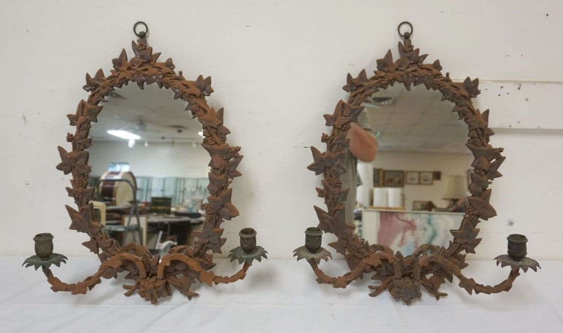 PAIR OF ORNATE CAST METAL MIRRORED WALL SCONCES: PAIR OF ORNATE CAST METAL MIRRORED WALL SCONCES