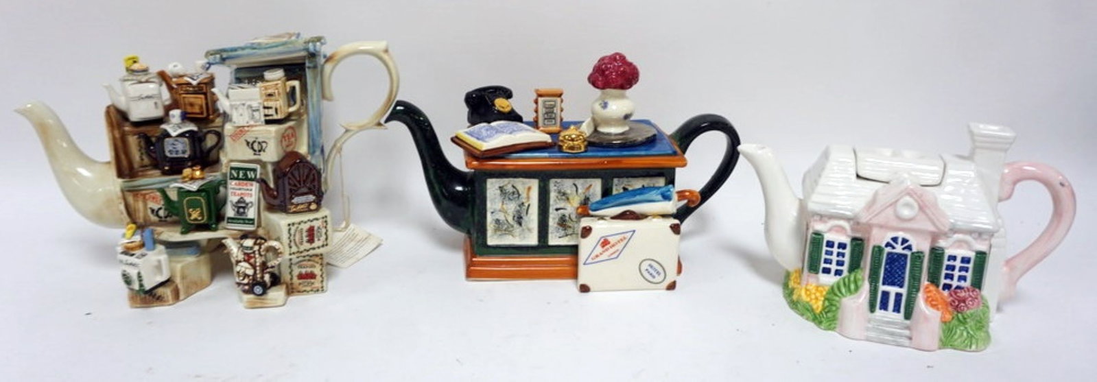 ORNAMENTAL TEA POTS: GROUP OF ORNAMENTAL TEA POTS, LARGEST APPROXIMATELY 12 IN X 7 IN X 9 IN H