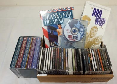 ASSORTED CDS AND DVDS