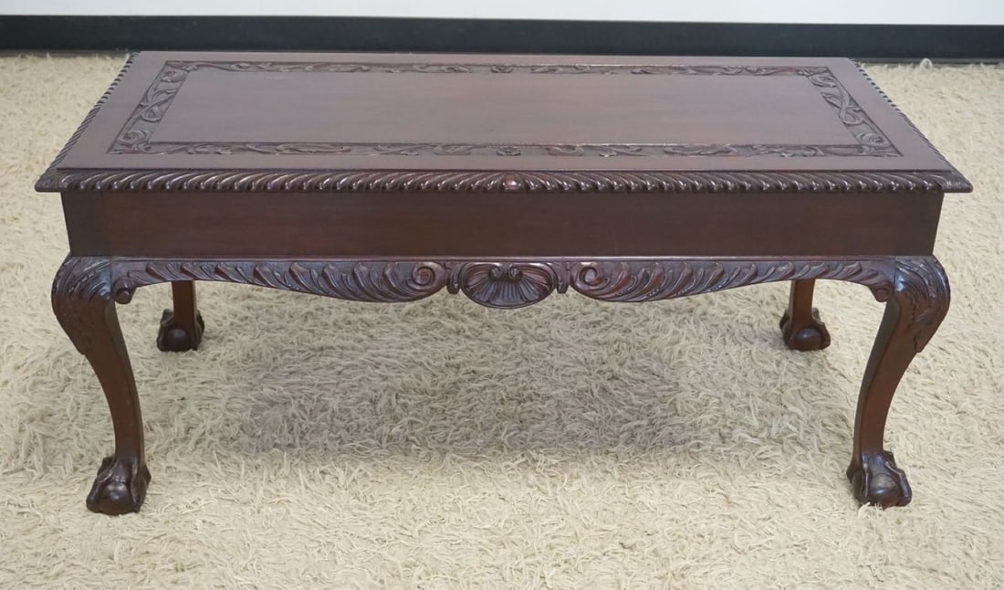 MAHOGANY BALL AND CLAW FOOT LONG STAND: MAHOGANY BALL AND CLAW FOOT LONG STAND WITH CARVED TOP AND SHELL CARVED SKIRT, 1 SIDE DRAWER, APPROXIMATELY 40 IN X 18 IN X 18 IN H