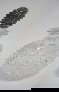 CUT GLASS BOTTLE: CUT GLASS BOTTLE W/STERLING TOP STOPPER, BOTTLE APPROXIMATELY 6 1/2 IN HIGH