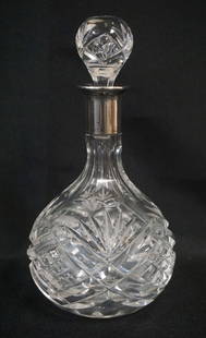 SMALL CUT GLASS BOTTLE: SMALL CUT GLASS BOTTLE W/800 SILVER COLLAR, APPROXIMATELY 8 IN HIGH