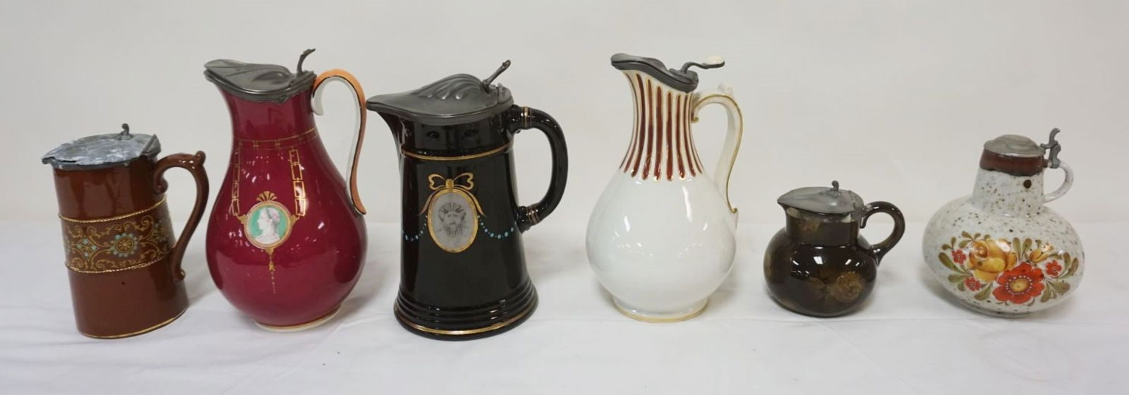 GROUP OF ASSORTED PEWTER LID PITCHERS (1 of 7)