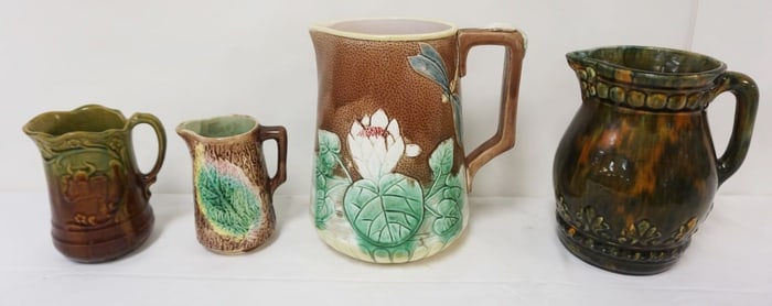 4 MAJOLICA PITCHERS