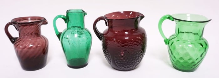 ASSORTED COLORED BLOWN GLASS PITCHERS