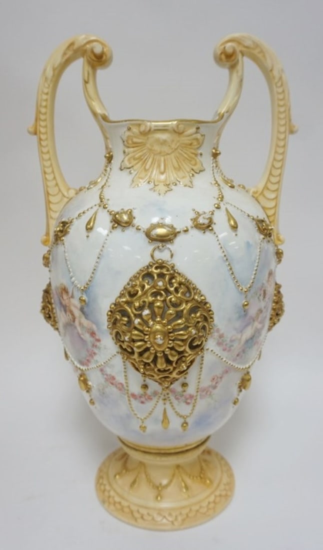 KNOWLES TAYLOR URN: LARGE KNOWLES TAYLOR LOTUS URN WITH CHERUBS AND EMBOSSED RETUICLATED GILT ACCENTS, APPROXIMATELY 18 IN H, SOME SPIDERS