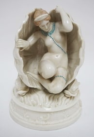 ANTIQUE PORCELAIN FIGURE