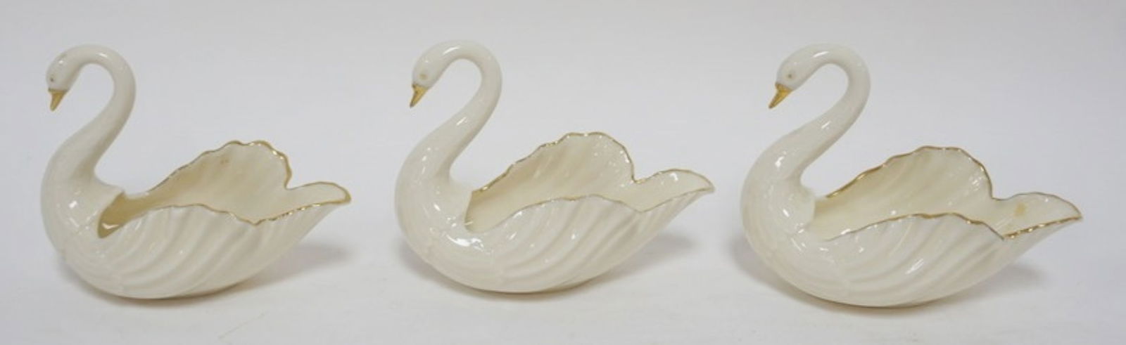 3 LENOX GREEN MARK SWANS: 3 LENOX GREEN MARK SWANS W/GILT TRIM, EACH APPROXIMATELY 4 IN HIGH