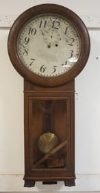 ANTIQUE WALL CLOCK IN OAK CASE