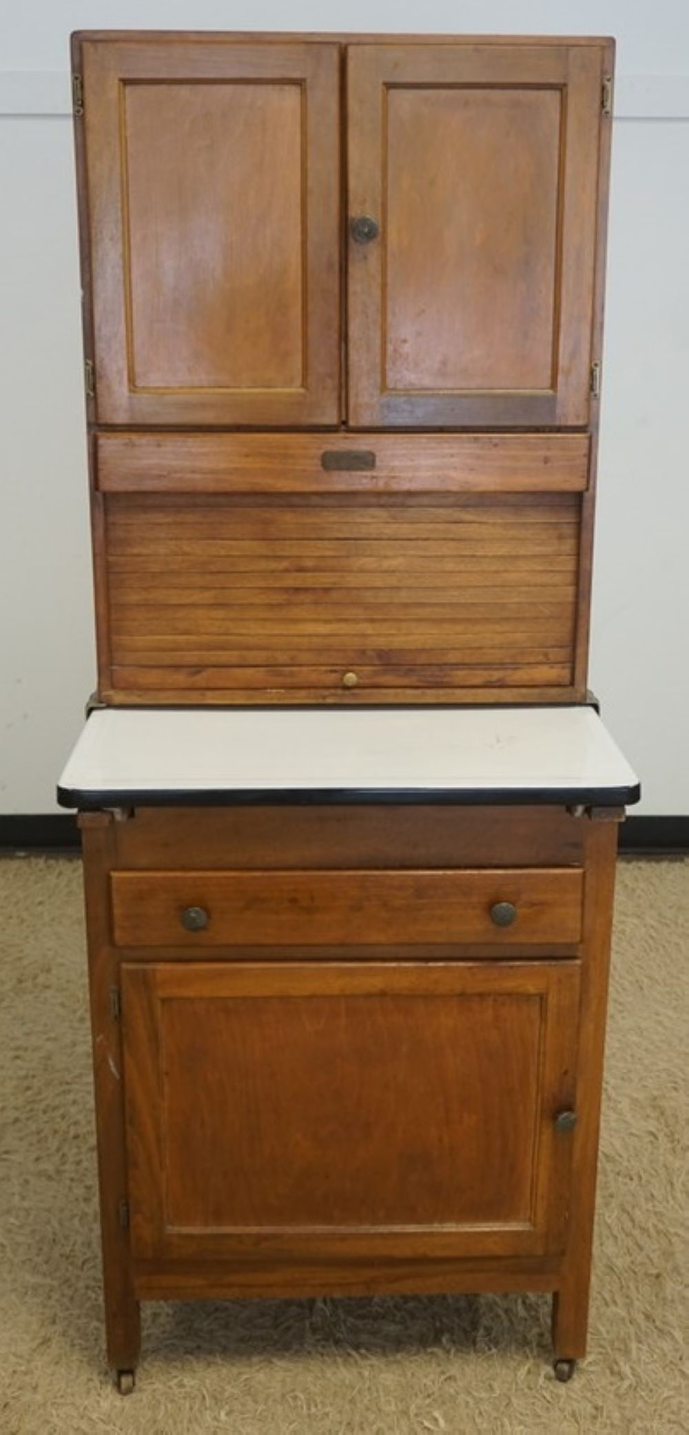 MONARCH NARROW KITCHEN CABINET: MONARCH NARROW KITCHEN CABINET WITH TAMBOR SLIDE AND ENAMELED TOP, APPROXIMATELY 28 IN X 25 IN X 68 IN H