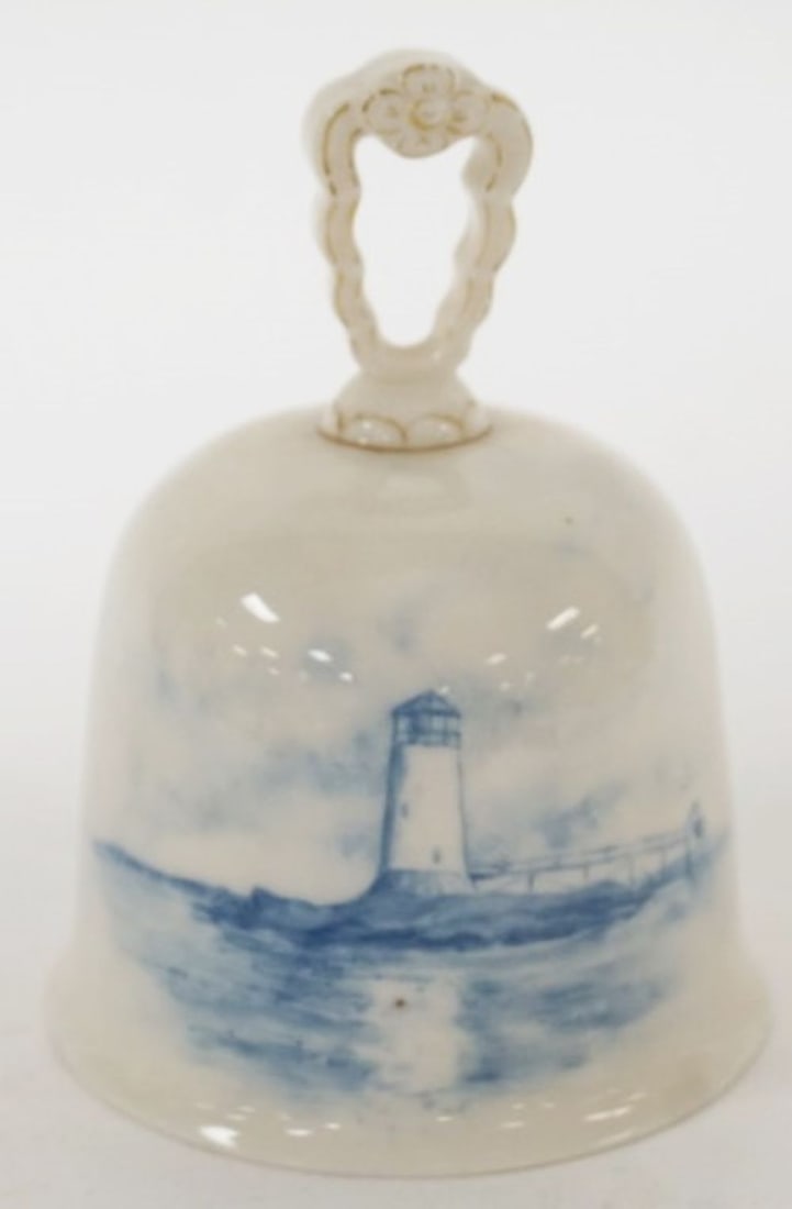 CAC CERAMIC ART CO BELLEEK BELL: CAC CERAMIC ART CO. BLUE AND WHITE AMERICAN BELLEEK BELL WITH IMAGE OF LIGHT HOUSE, APPROXIMATELY 4 1/4 IN H