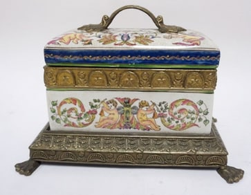 PORCELAIN COVERED BOX IN ORNATE METAL STAND
