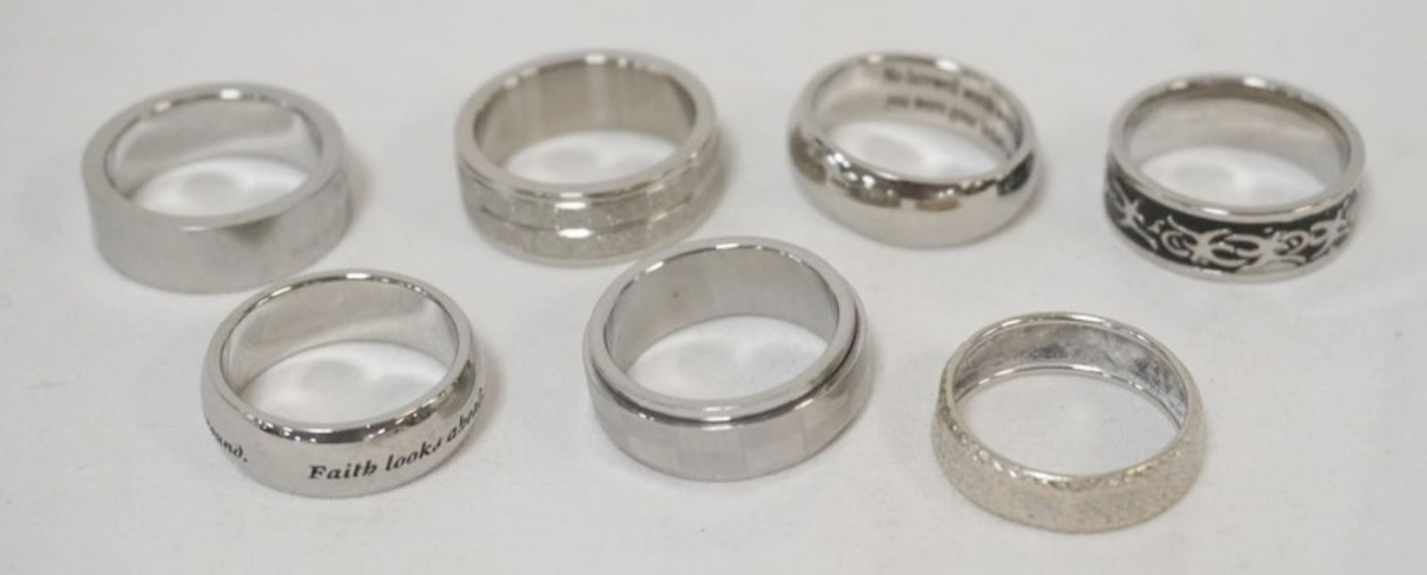 LADIES DESIGNER BAND RINGS: 7 LADIES DESIGNER BAND RINGS, MANY MARKED