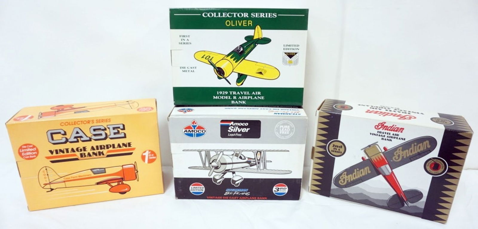 DIE CAST AIRPLANE BANKS: 4 DIE CAST AIRPLANE COIN BANKS IN ORGINAL BOXES