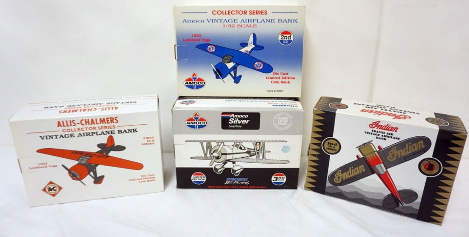 DIE CAST AIRPLANE BANKS: 4 DIE CAST AIRPLANE COIN BANKS IN ORGINAL BOXES