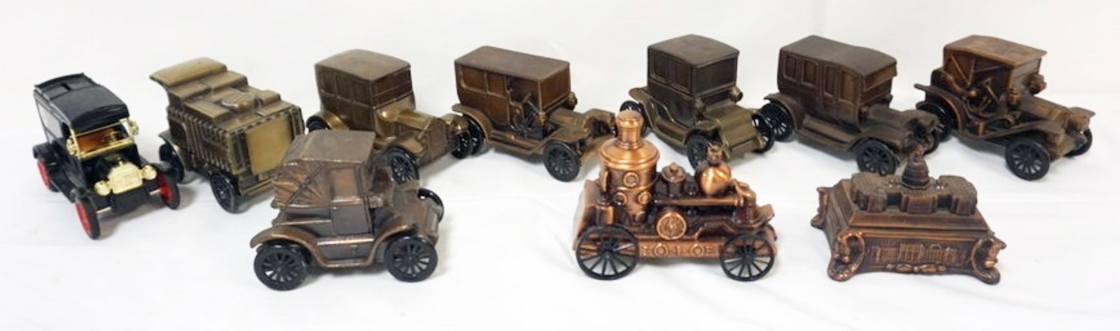 ASSORTED CAST METAL CAR AND RELATED BANKS: GROUP OF ASSORTED CAST METAL CAR AND RELATED BANKS