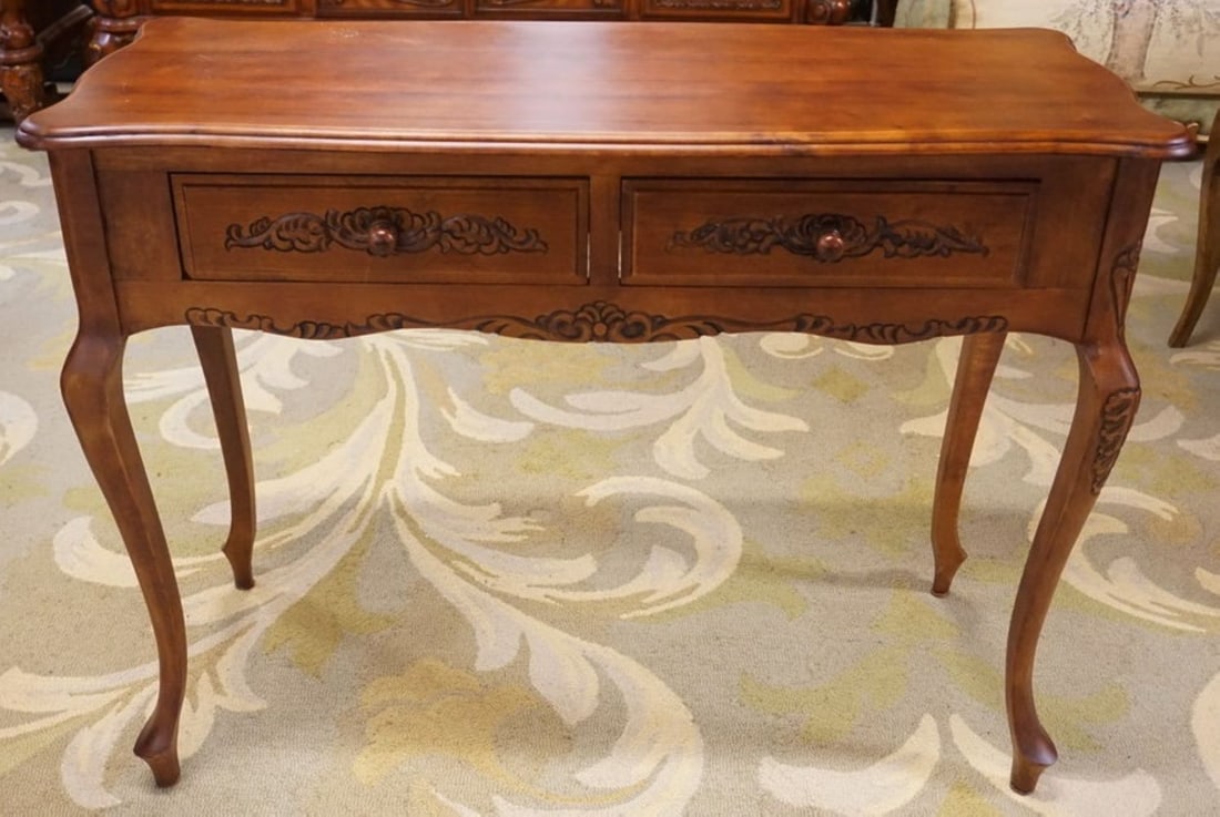 CHERRY FINISH STAND: 2 DRAWER STAND WITH CARVED DRAWER FRONTS IN CHERRY FINISH, APPROXIMATELY 39 IN X 16 IN X 29 IN H