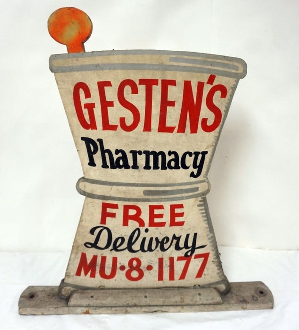 WOOD APOTHECARY STORE SIGN: WOOD APOTHECARY STORE SIGN *GESTEN'S PHARMACY* W/IMAGE OF MORTAR & PESTLE, APPROXIMATELY 27 IN X 29 IN HIGH