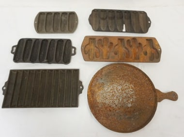 ANTIQUE CAST IRON CORN BREAD MOLDS AND GRIDDLE