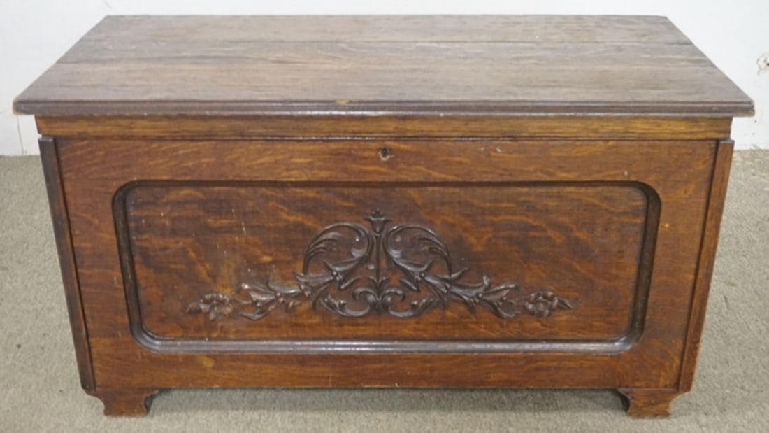 OAK STORAGE CHEST: OAK STORAGE CHEST WITH PANELED SIDES AND APPLIED CARVING, APPROXIMATELY 44 IN X 21 IN X 24 IN H