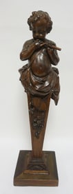 CARVED OAK CHERUB PLAYING FLUTE