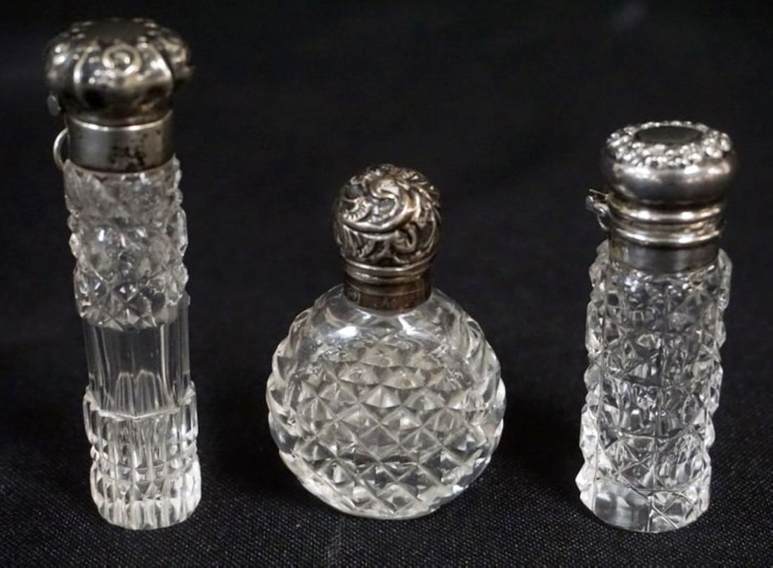 SILVER TOPPED CUT GLASS PERFUME BOTTLES (1 of 3)