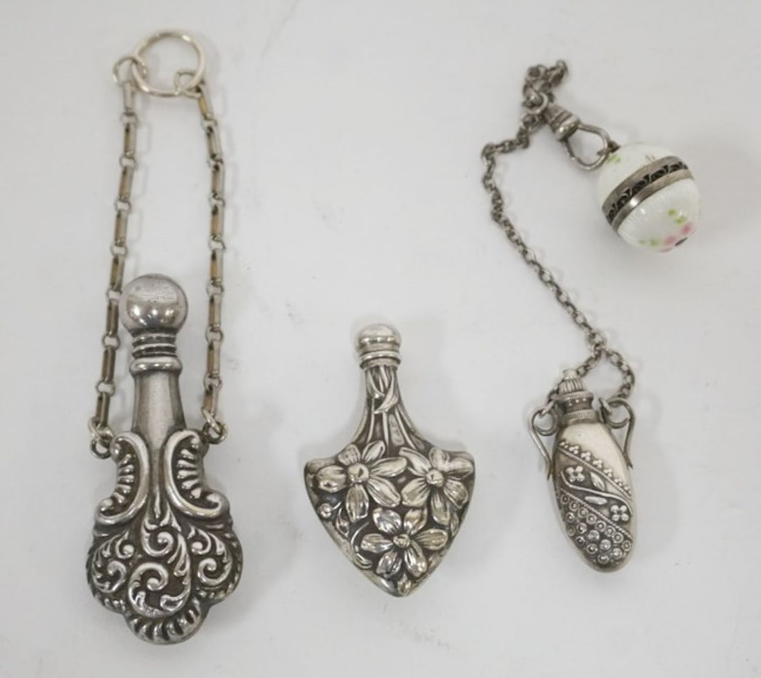 REPOUSSE SILVER PERFUMES: 3 REPOUSSE SILVER LADIES SCENT PERFUMES, 1 WITH ENAMEL PIN CLASP, LARGEST APPROXIMATELY 2 1/4 IN