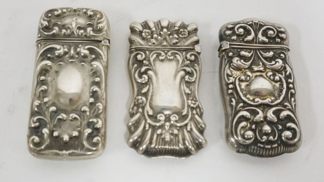 REPOUSSE STERLING MATCH SAFES: GROUP OF 3 REPOUSSE STERLING MATCH SAFES, 1.4 OZT, LARGEST APPROXIMATELY 2 1/2 IN X 1 IN X 1/2 IN