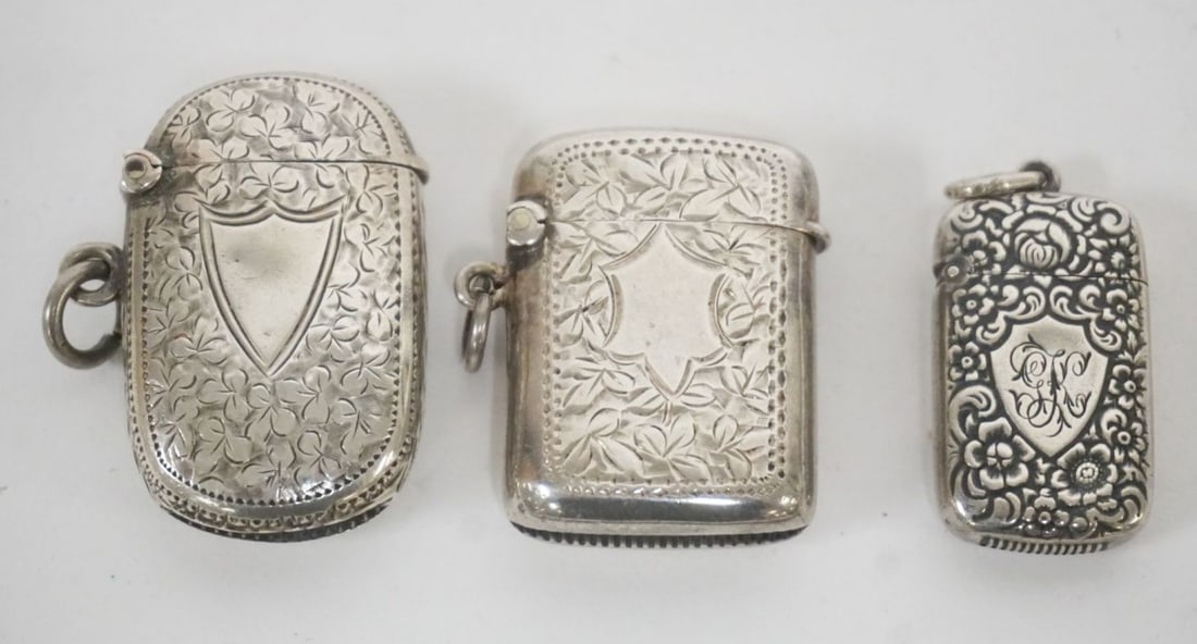 REPOUSSE STERLING MATCH SAFES: GROUP OF 3 REPOUSSE STERLING MATCH SAFES, 1.3 OZT, LARGEST APPROXIMATELY 1 3/4 IN X 1 IN X 1/2 IN