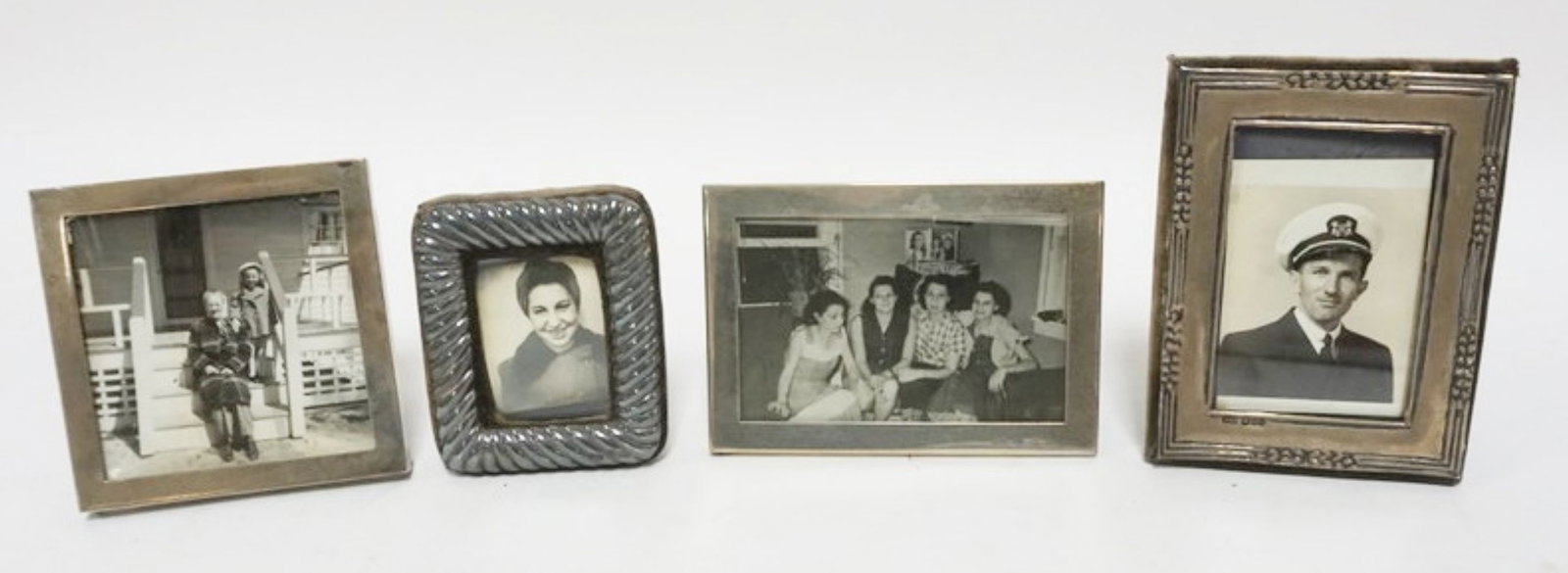 SILVER & STERLING SILVER FRAMES: GROUP OF 4 SILVER & STERLING SILVER FRAMES, LARGEST APPROXIMATELY 3 1/2 IN X 5 IN