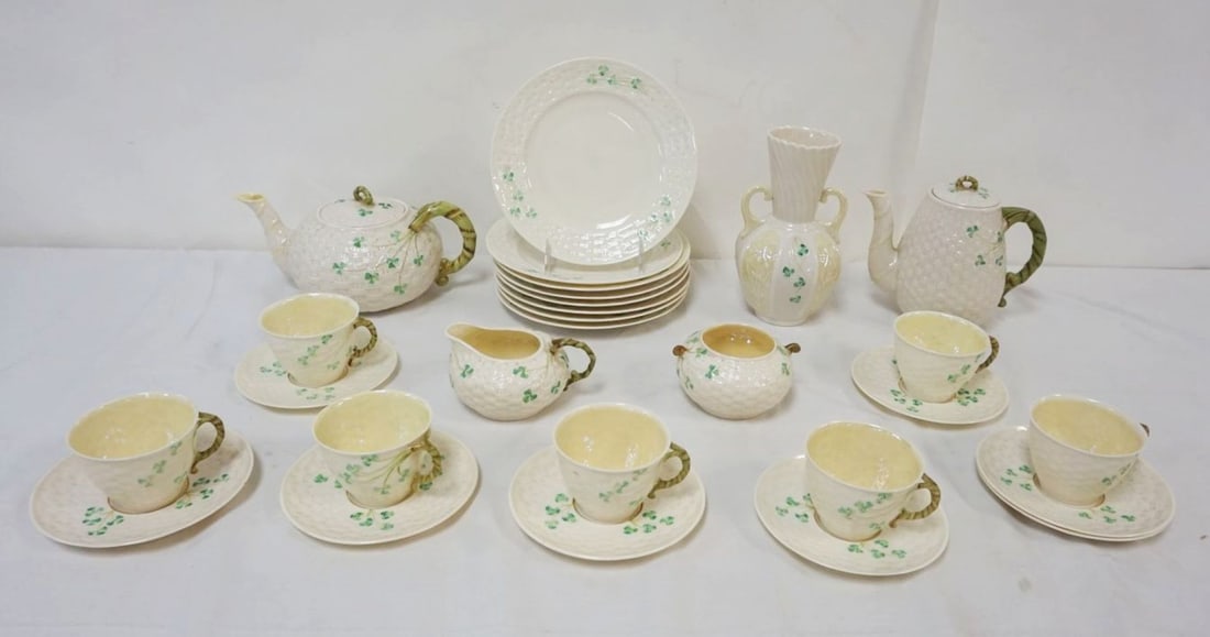 IRISH BELLEEK 28 PIECES: IRISH BELLEEK 28 PIECES INCLUDING 8-8 1/4 IN PLATES, 8-5 3/4 IN PLATES, CUPS, SAUCERS, TEAPOTS, VASE, LARGEST PIECE APPROXIMATELY 8 IN HIGH