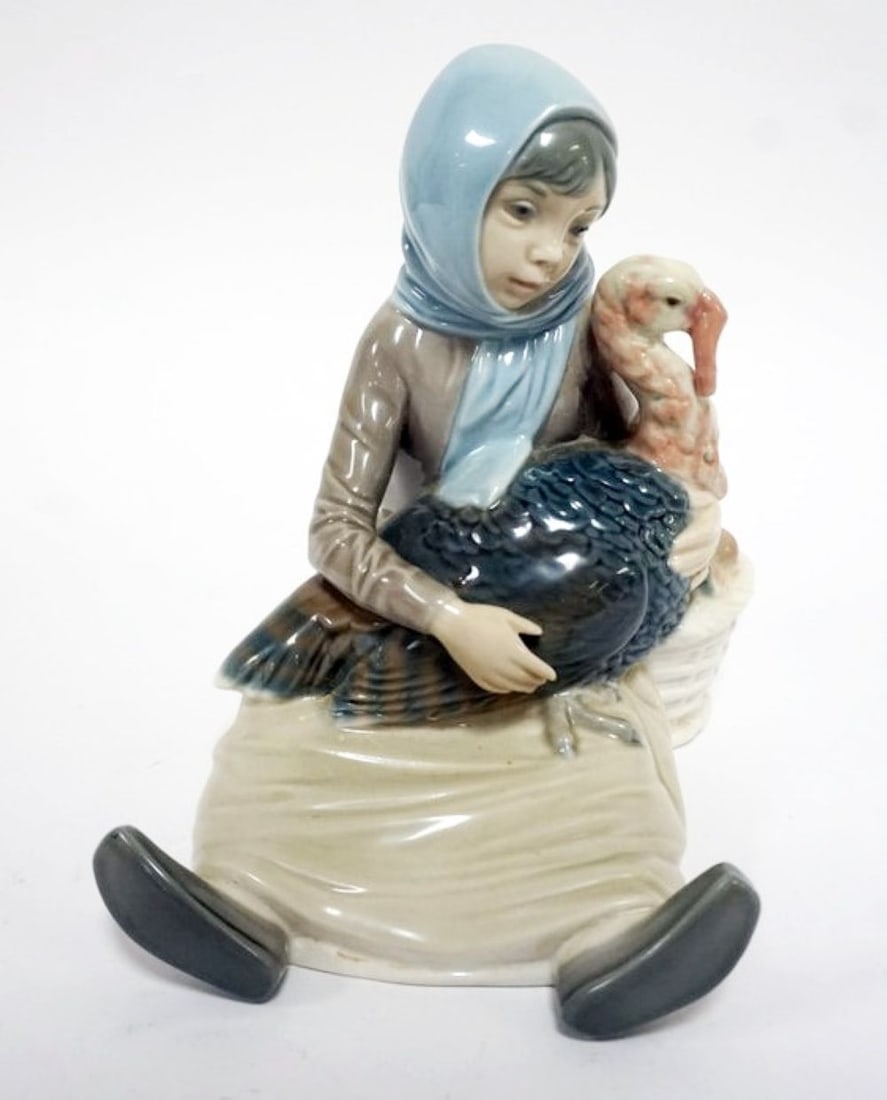 LLADRO PORCELAIN FIGURE: LLADRO PORCELAIN FIGURE *GIRL WITH TURKEY* APPROXIMATELY 6 1/2 IN HIGH