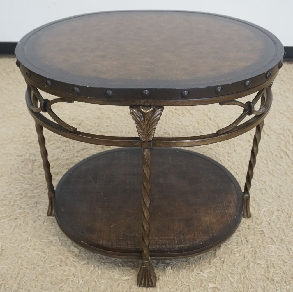 OVAL METAL LAMP TABLE: OVAL METAL LAMP TABLE WITH INSET LEATHER TOP AND WOVEN CENTER BASE, APPROXIMATELY 29 IN X 25 IN X 26 IN H