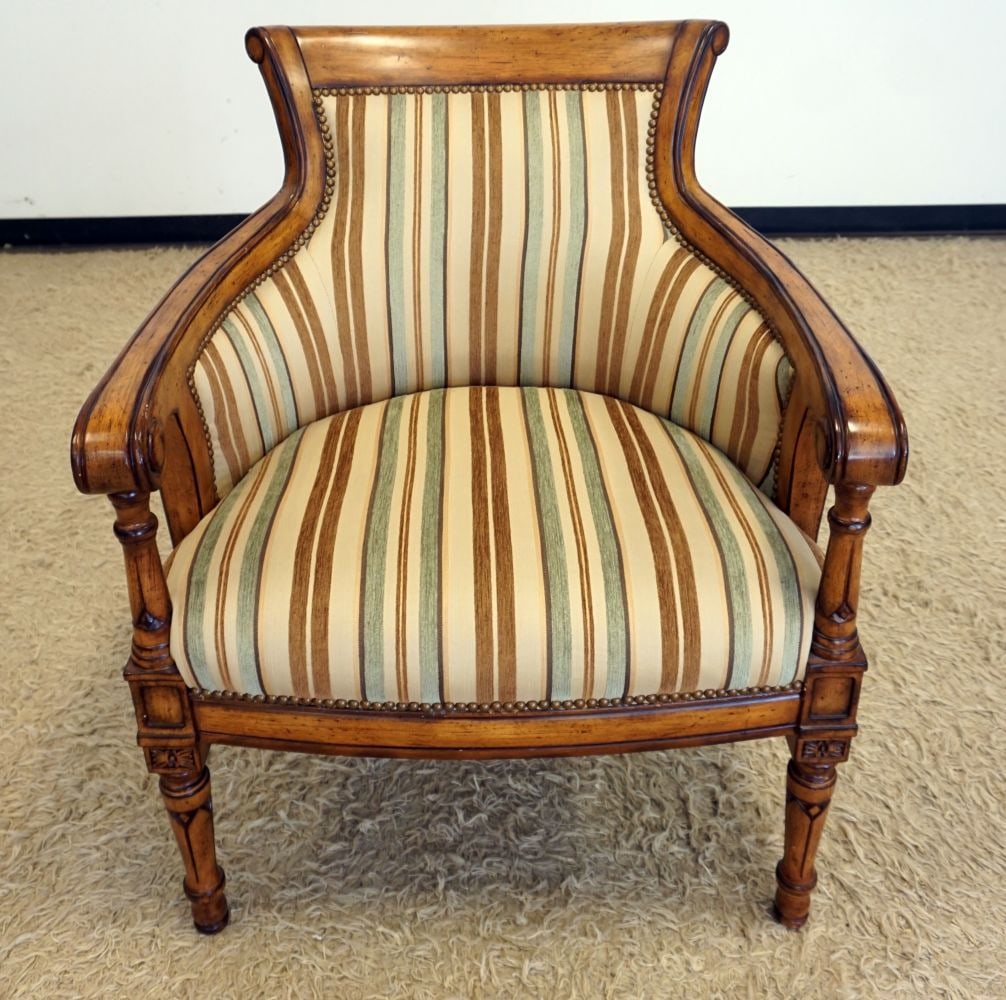 UPHOLSTERED ARM CHAIR: UPHOLSTERED ARM CHAIR, APPROXIMATELY 29 IN X 27 IN X 36 IN H