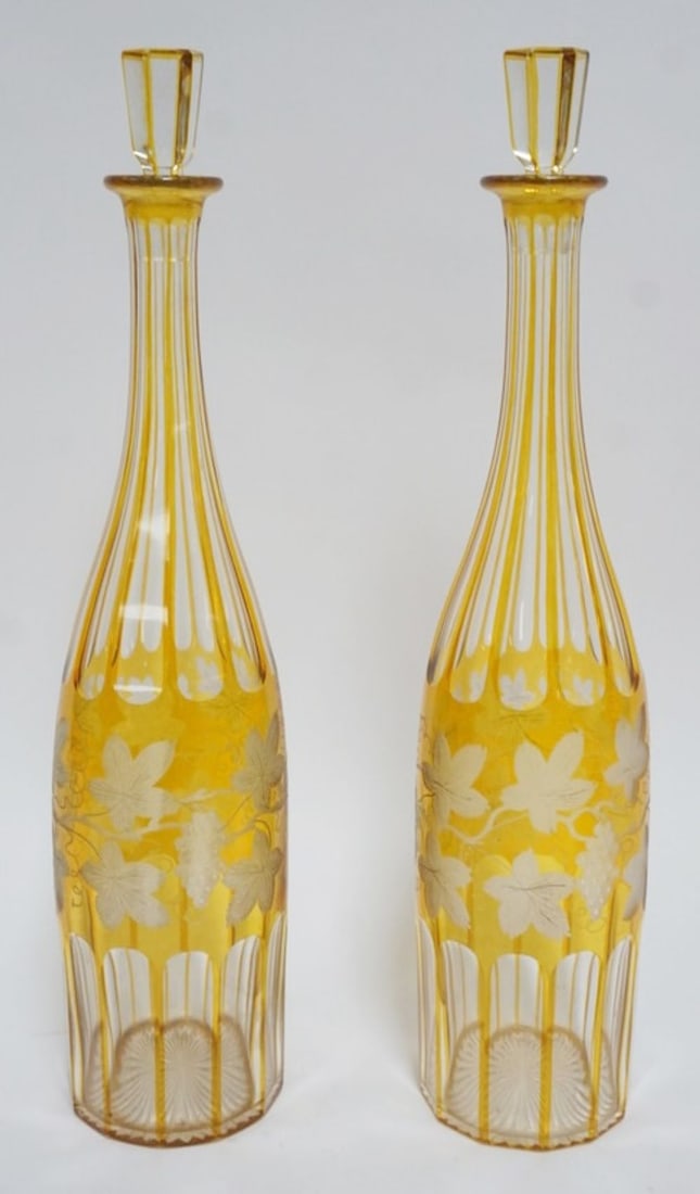 BOHEMIAN GLASS DECANTORS: BOHEMIAN GLASS AMBER CUT TO CLEAR DECANTORS, EACH APPROXIMATELY 14 1/2 IN H