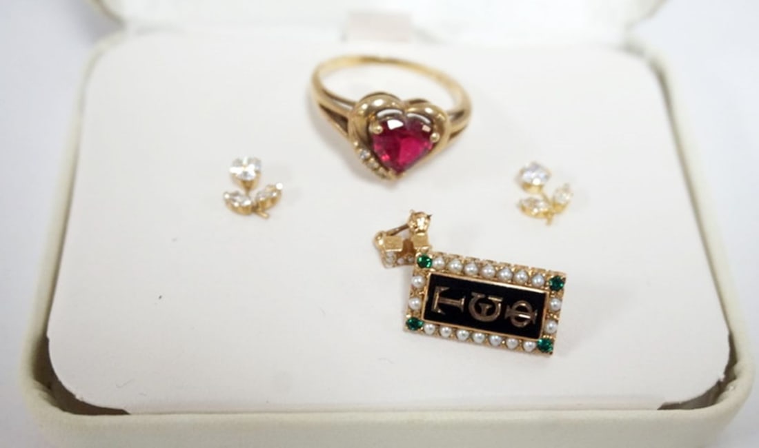 10K GOLD ASSORTED JEWELRY: 10K GOLD ASSORTED JEWELRY INCLUING CZ FLOWER EARRINGS, RED HEART STONE RING APPROXIMATE SIZE 9 1/4 AND FRATERNITY PIN WITH STONES