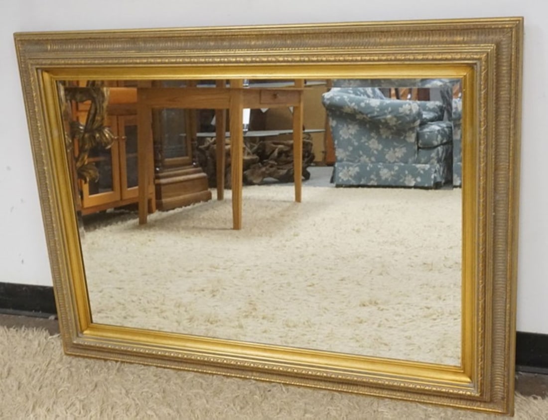 MIRROR IN GILT FINISH FRAME: BEVELED EDGE MIRROR IN GILT FINISH FRAME, APPROXIMATELY 44 IN X 32 IN
