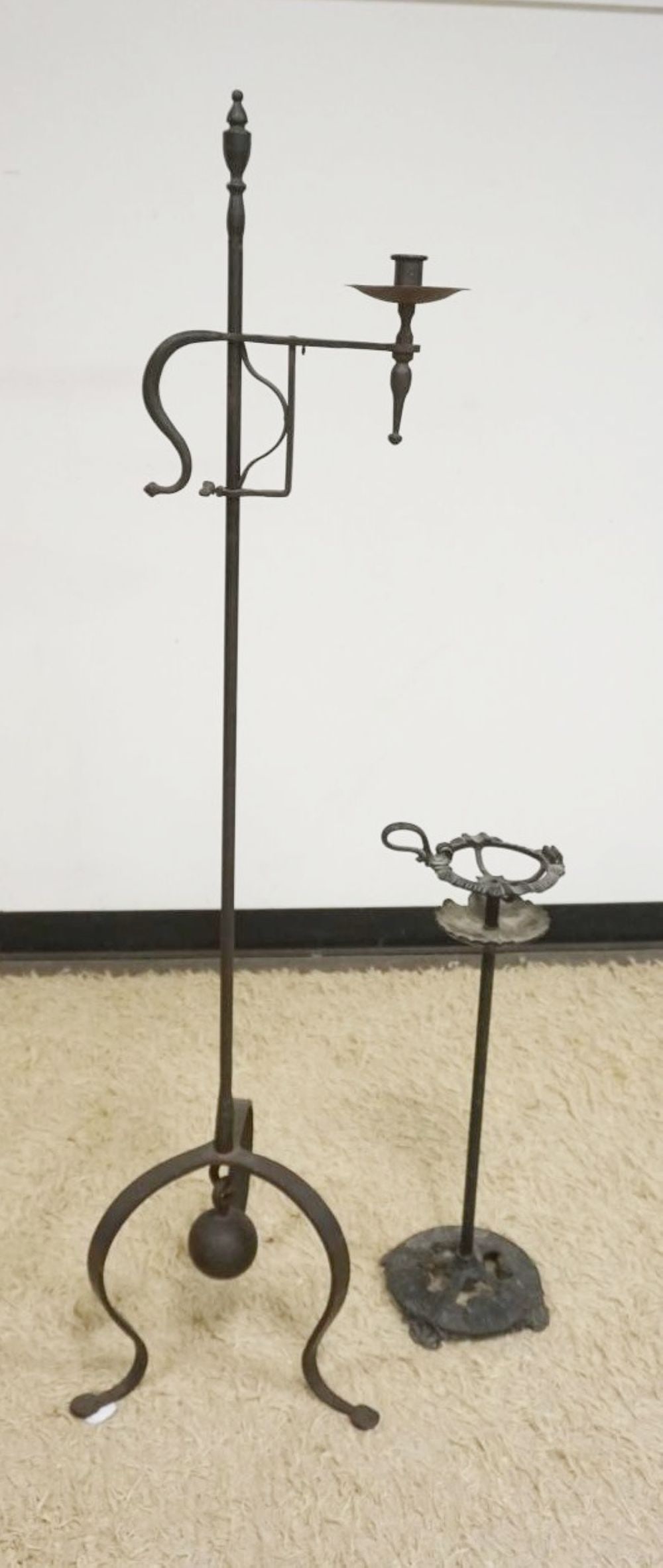 WROUGHT IRON CANDLE STAND & ASH TRAY STAND: WROUGHT IRON CANDLE STAND & CAST METAL ASH TRAY STAND, TALLEST APPROXIMATELY 61 IN HIGH