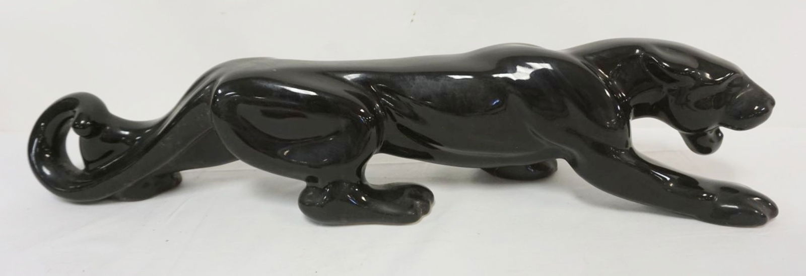MCM POTTERY BLACK STALKING PANTHER: MIDCENTURY MODERN POTTERY BLACK STALKING PANTHER, APPROXIMATELY 24 IN LONG