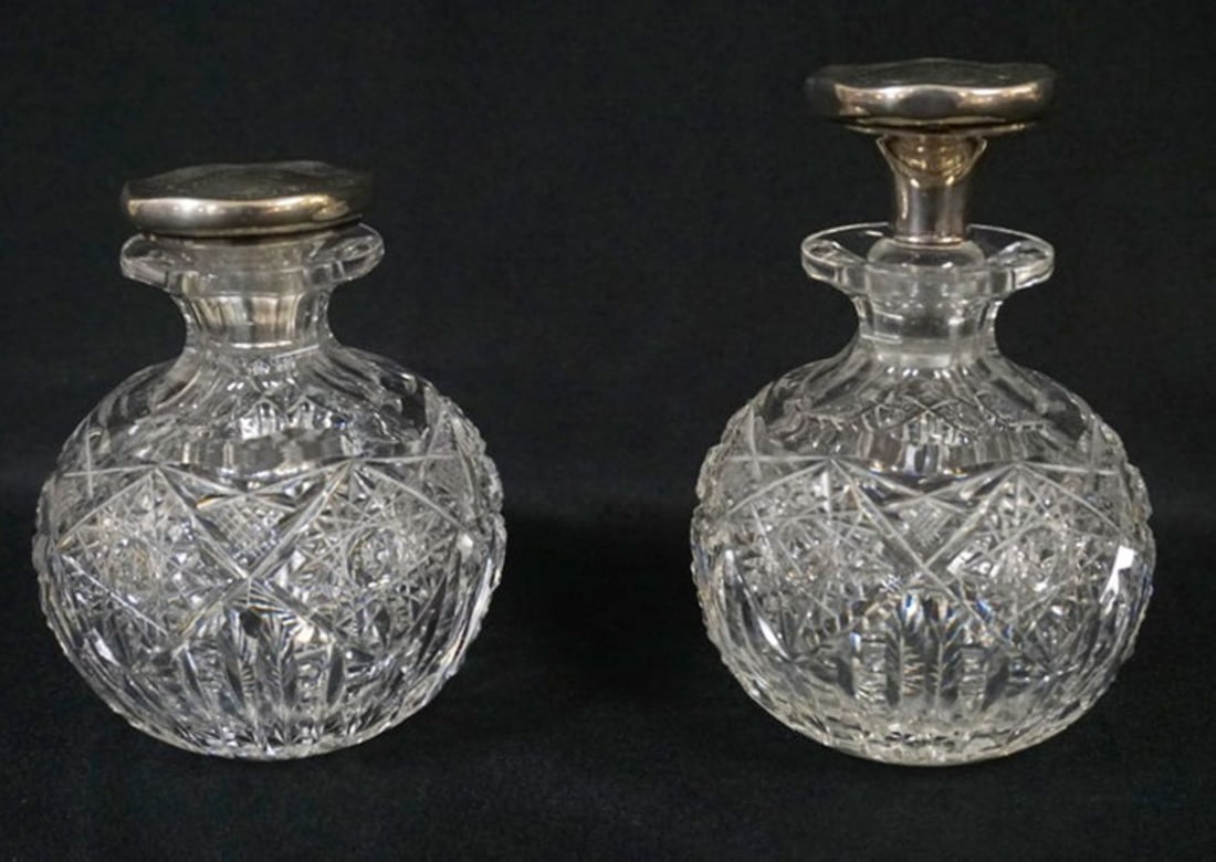 CUT GLASS BOTTLES WITH STERLING SILVER STOPPERS: CUT GLASS BOTTLES WITH STERLING SILVER OVERLAY STOPPERS, EACH APPROXIMATELY 6 IN H, 1 STOPPER BROKE