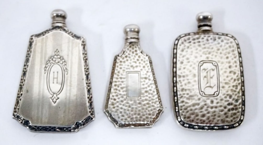 STERLING SILVER PERFUME BOTTLES: 3 STERLING SILVER SCENT PERFUME BOTTLES, TALLEST APPROXIMATELY 2 IN