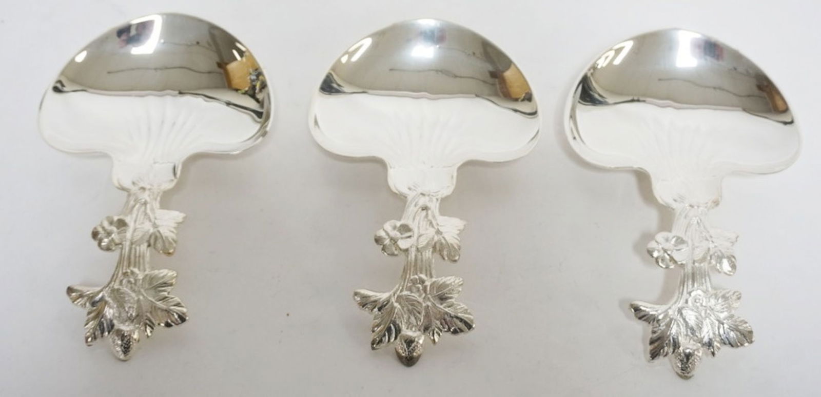 CHRISTOFLE SERVING SPOONS: CHRISTOFLE STRAWBERRY SERVING SPOONS, EACH APPROXIMATELY 4 IN X 6 1/4 IN