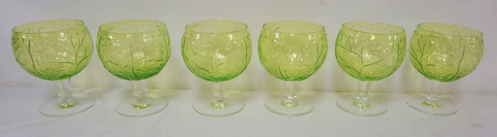 6 VINTAGE SIGMA GREEN EMBOSSED CABBAGE GOBLETS: 6 VINTAGE SIGMA GREEN EMBOSSED CABBAGE PATTERN GOBLETS, EACH APPROXIMATELY 6 IN HIGH