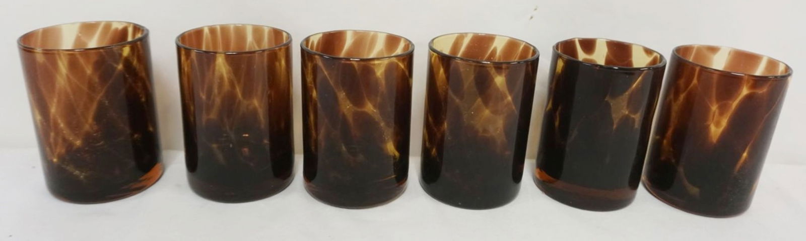 SET OF 6 TORTIOSE SHELL BLOWN GLASS TUMBLERS: SET OF 6 TORTIOSE SHELL BLOWN GLASS TUMBLERS, EACH APPROXIMATELY 4 IN HIGH