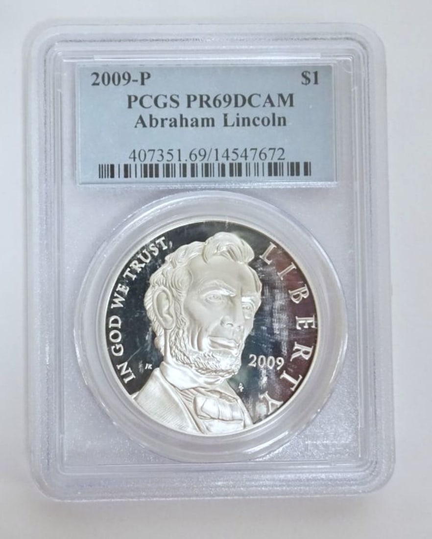 ABRAHAM LINCOLN SILVER DOLLAR (1 of 3)