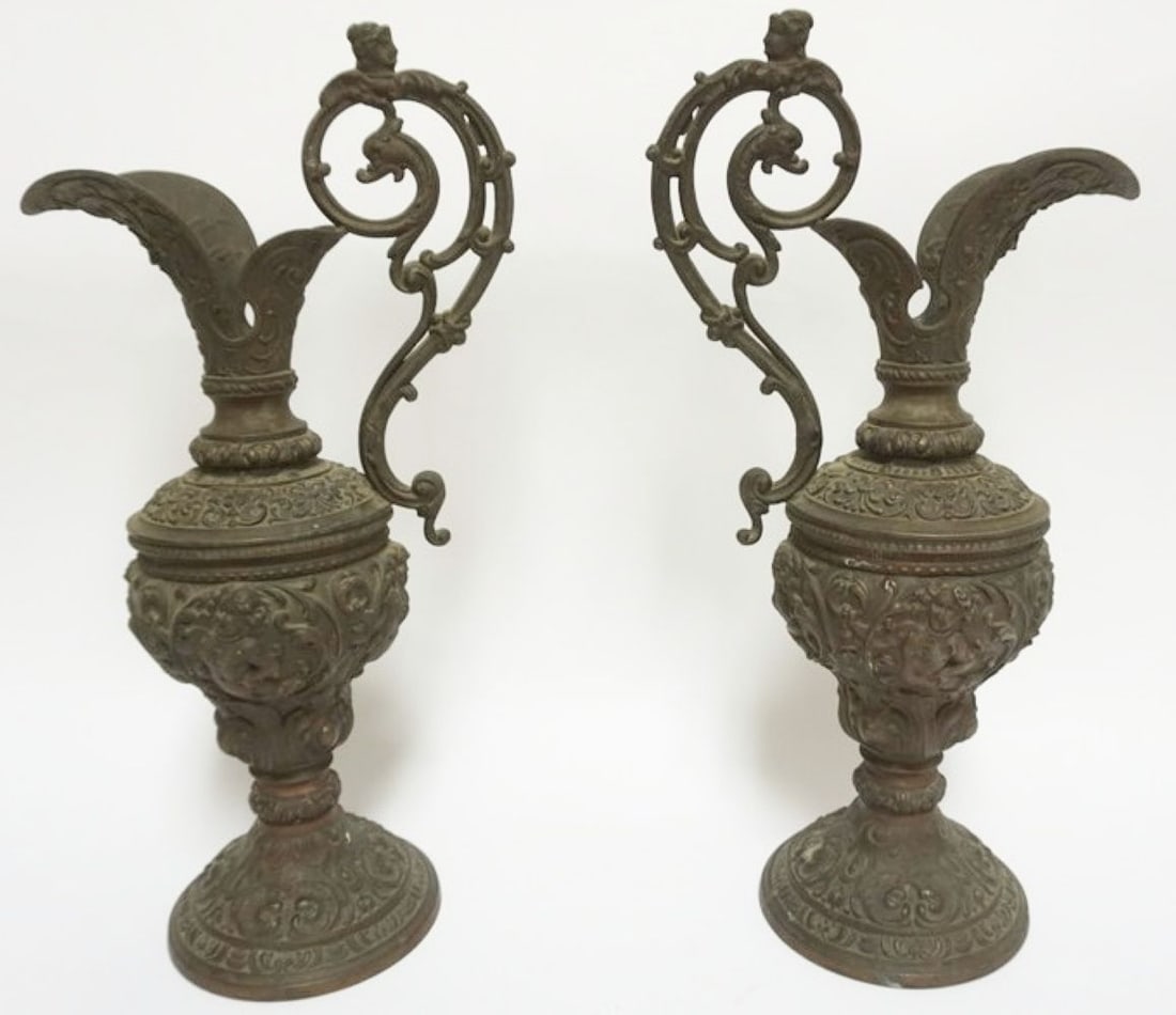 PAIR CHERUB EWERS: PAIR OF CAST METAL CHERUB EWERS, EACH APPROXIMATELY 17 IN H